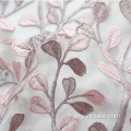 Tissu en dentelle avec broderie layser rose clair